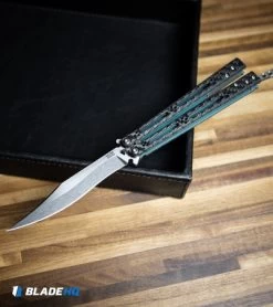 Hom Design Basilisk-R Balisong Butterfly Knife CF W/Teal Liners (4.6" Stonewash) -Buck Knives Store Hom Design Basilisk R Balisong Butterfly Knife CF Teal Liners SW BHQ 89528 kp desk web