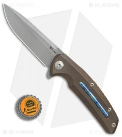 Reate Knives New Epoch Frame Lock Knife Bronze Titanium W/Mokuti Inlay (3.5" SW) -Buck Knives Store Reate Knives New Epoch Bronze Ti Mokuti inlay SW BHQ 37648 er bottlecap