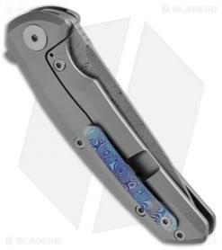 Reate Knives New Epoch Frame Lock Knife Titanium W/Mokuti Inlay (3.5" Damasteel) -Buck Knives Store Reate New Apoch Ti Mokuti Inlay Damasteel BHQ 51443 jr side